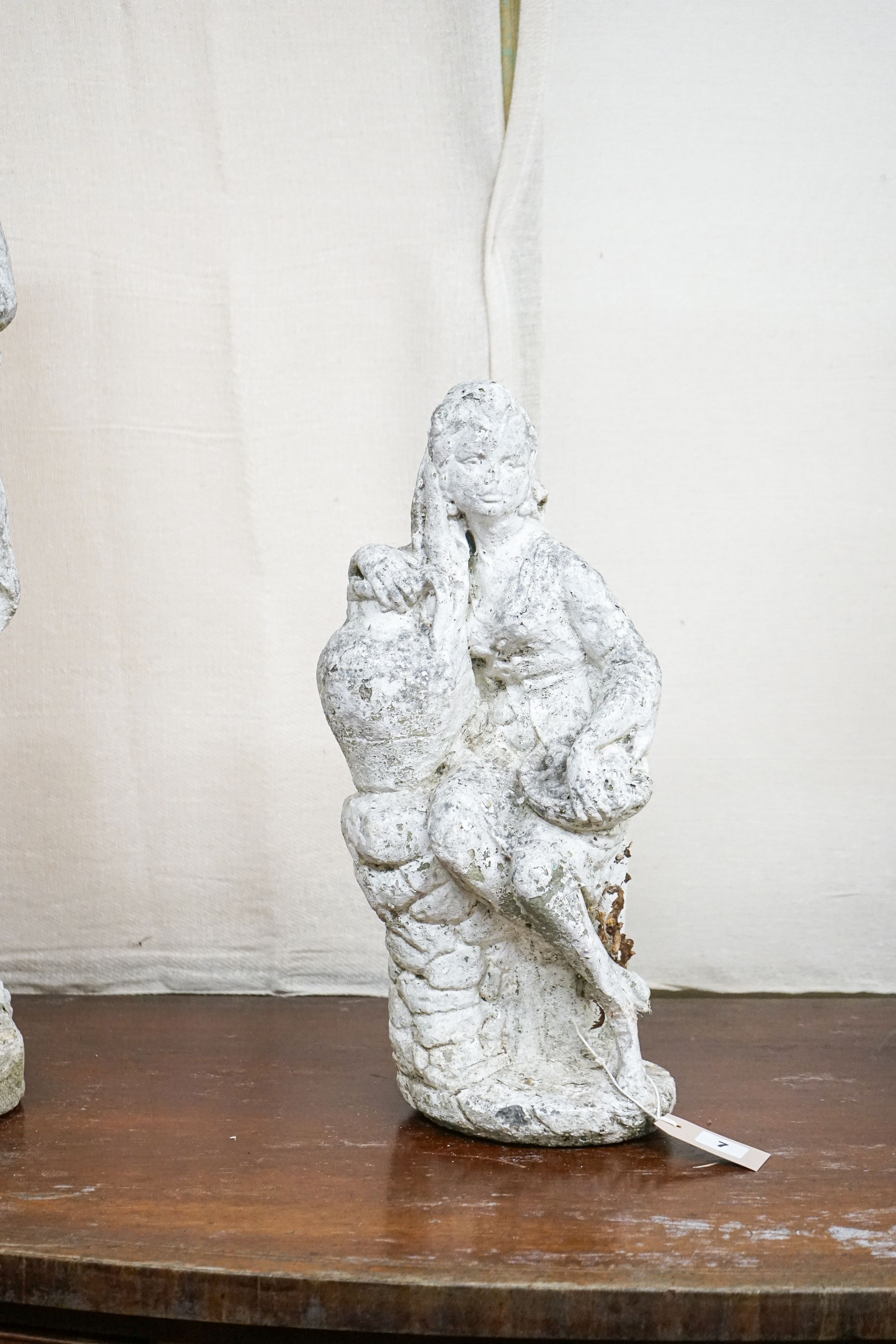 Three reconstituted stone garden ornaments, largest height 76cm